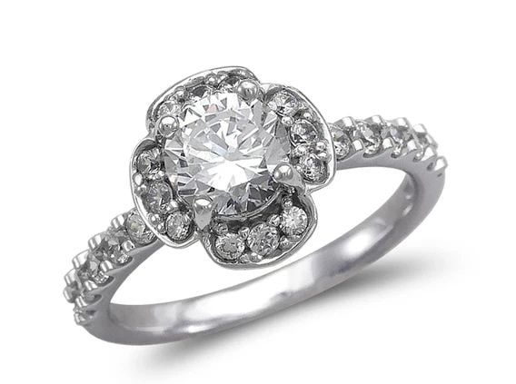 NEW 14K WHITE GOLD LADIES FANCY WHITE FLOWER SOLITAIRE RING: NEW 14K WHITE GOLD LADIES FANCY WHITE FLOWER SOLITAIRE RING LADIES FANCY WHITE FLOWER SOLITAIRE RING NEW 14K WHITE GOLD Apx. WIDTH: 11mm Apx. WEIGHT: 4.0g