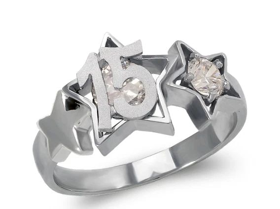 NEW 14K WHITE GOLD 15 ANOS STAR RING: NEW 14K WHITE GOLD 15 ANOS STAR RING 15 ANOS STAR RING NEW 14K WHITE GOLD Apx. WIDTH: 10mm Apx. WEIGHT: 3.6g