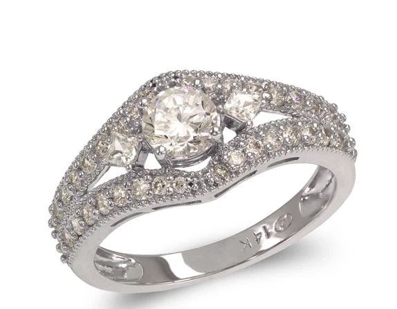NEW 14K WHITE GOLD LADIES FANCY WHITE SOLITAIRE RING: NEW 14K WHITE GOLD LADIES FANCY WHITE SOLITAIRE RING LADIES FANCY WHITE SOLITAIRE RING NEW 14K WHITE GOLD Apx. WIDTH: 5mm Apx. WEIGHT: 3.6g