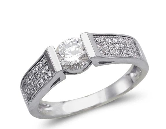 NEW 14K WHITE GOLD LADIES FANCY WHITE SOLITAIRE RING: NEW 14K WHITE GOLD LADIES FANCY WHITE SOLITAIRE RING LADIES FANCY WHITE SOLITAIRE RING NEW 14K WHITE GOLD Apx. WIDTH: 5mm Apx. WEIGHT: 3.4g
