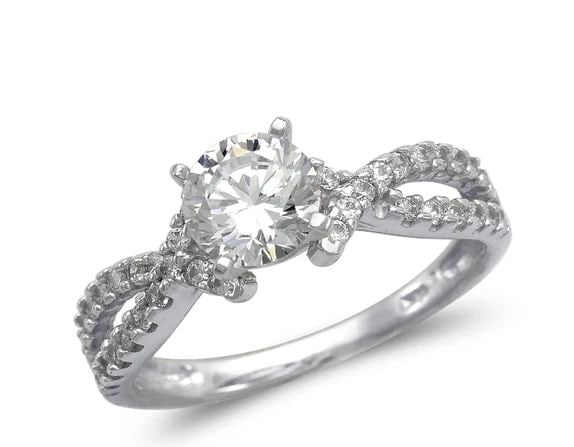 NEW 14K WHITE GOLD LADIES FANCY WHITE SOLITAIRE RING: NEW 14K WHITE GOLD LADIES FANCY WHITE SOLITAIRE RING LADIES FANCY WHITE SOLITAIRE RING NEW 14K WHITE GOLD Apx. WIDTH: 6mm Apx. WEIGHT: 3.4g