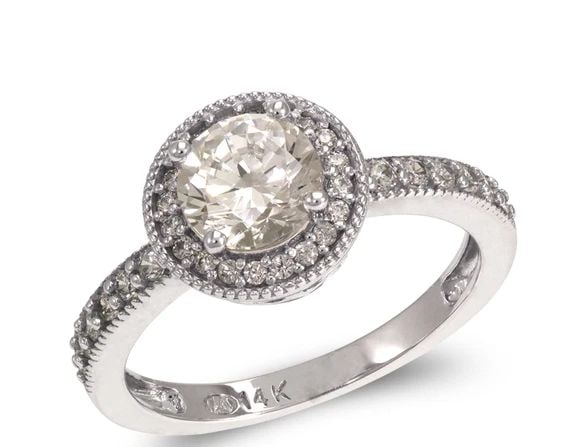 NEW 14K WHITE GOLD LADIES FANCY WHITE SOLITAIRE HALO RING: NEW 14K WHITE GOLD LADIES FANCY WHITE SOLITAIRE HALO RING LADIES FANCY WHITE SOLITAIRE HALO RING NEW 14K WHITE GOLD Apx. WIDTH: 8mm Apx. WEIGHT: 3.4g