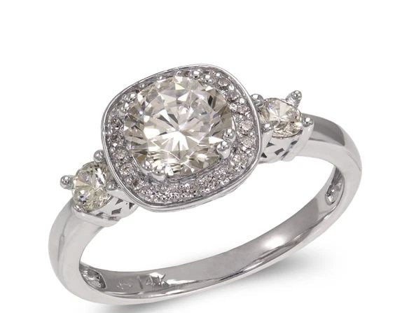 NEW 14K WHITE GOLD LADIES FANCY WHITE SOLITAIRE HALO RING: NEW 14K WHITE GOLD LADIES FANCY WHITE SOLITAIRE HALO RING LADIES FANCY WHITE SOLITAIRE HALO RING NEW 14K WHITE GOLD Apx. WIDTH: 6mm Apx. WEIGHT: 3.1g