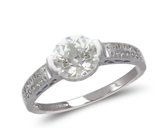 NEW 14K WHITE GOLD LADIES FASHION WHITE SOLITAIRE RING: NEW 14K WHITE GOLD LADIES FASHION WHITE SOLITAIRE RING LADIES FASHION WHITE SOLITAIRE RING NEW 14K WHITE GOLD Apx. WIDTH: 7mm Apx. WEIGHT: 3.0g