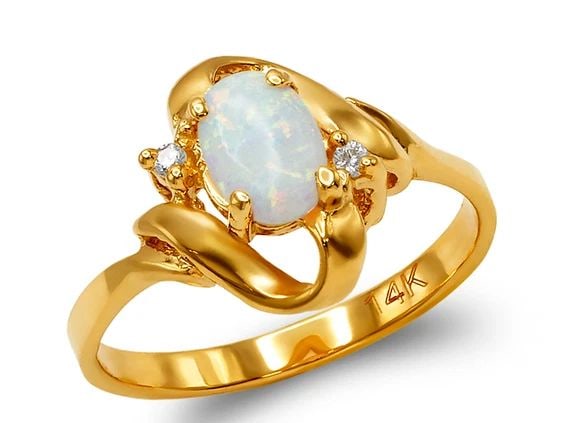NEW 14K TWO TONE GOLD LADIES OPAL RING: NEW 14K TWO TONE GOLD LADIES OPAL RINGLADIES OPAL RINGNEW 14KTWO TONE GOLDApx. WIDTH: 12mmApx. WEIGHT: 2.5g