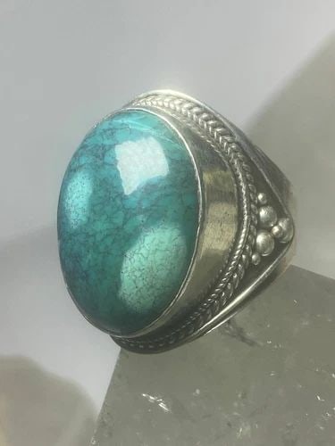 TURQUOISE RING TRIBAL CIGAR BAND STERLING SILVER WOMEN MEN: TURQUOISE RING TRIBAL CIGAR BAND STERLING SILVER WOMEN MEN Turquoise ring tribal cigar band sterling silver women men Size 9.75 Weight 20g Length. 1" Width. 5/8" Thinnest part of band 3/16"