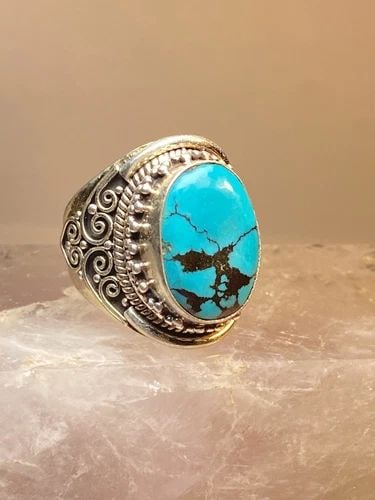 TURQUOISE RING STERLING SILVER WOMEN MEN: TURQUOISE RING STERLING SILVER WOMEN MEN Turquoise ring sterling silver women men Size 9.75 adjustable Weight 14.4g Length 1" Width 1/2" Thinnest part of band 1/4"