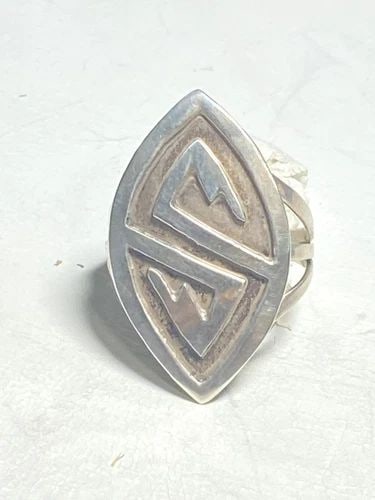 HOPI RING LONG SYMBOLS STERLING SILVER WOMEN GIRLS: HOPI RING LONG SYMBOLS STERLING SILVER WOMEN GIRLS Hopi ring long symbols sterling silver women girls Size 8.25 Weight 5.2g Length. 1 1/4" Width 3/4" Thinnest part of band 1/8"