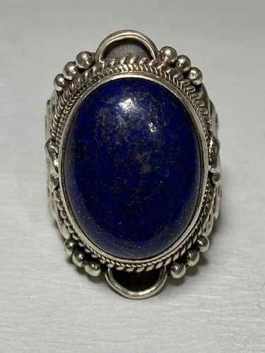 BLUE LAPIS RING SIZE 7.50 TRIBAL STERLING SILVER WOMEN MEN: BLUE LAPIS RING SIZE 7.50 TRIBAL STERLING SILVER WOMEN MEN Blue Lapis ring tribal sterling silver women men Size 7.50 Between a size 7.50 and a size 7.75 weight 17.8g Length 1. 1/8" Width. 1/2" Thinne