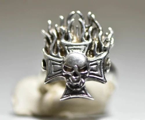 SKULL RING BIKER BAND FLAMES GREEK CROSS STERLING SILVER MEN: SKULL RING BIKER BAND FLAMES GREEK CROSS STERLING SILVER MEN Skull Ring biker band flames Greek Cross sterling silver men Size . 10.50 weight 14.9g Length of front 1 1/4" Width of band . 15/16" Thinne