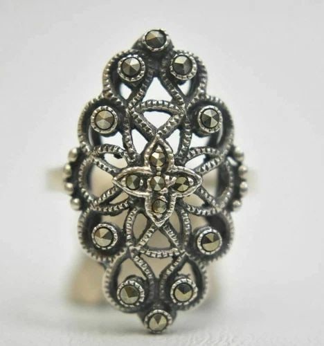 LONG MARCASITES RING ART DECO STERLING SILVER SIZE 8.25: LONG MARCASITES RING ART DECO STERLING SILVER SIZE 8.25 Long Marcasite Ring Art Deco Sterling Silver Size 8.25 Weight 4.7g Widest Part of Band 1" Thinnest Part of Band 3/32"