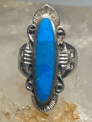 TURQUOISE RING SOUTHWEST STERLING SILVER WOMEN GIRLS: TURQUOISE RING SOUTHWEST STERLING SILVER WOMEN GIRLS Long Turquoise ring southwest sterling silver women girls Size 6.75 Weight. 9.5g Length. 1 1/4" Width. 1/2" Thinnest part 1/8"