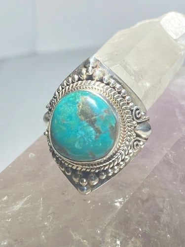 TURQUOISE RING TWIST STERLING SILVER WOMEN MEN: TURQUOISE RING TWIST STERLING SILVER WOMEN MEN Turquoise ring twist sterling silver women men Size 8.50 Weight 10.8g Length.1 1/8" of setting Length of stone. 9/16" Width of stone 7/16 " Thinnest part