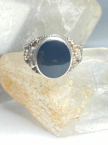 POISON RING ONYX STERLING SILVER WOMEN: POISON RING ONYX STERLING SILVER WOMEN Poison ring Onyx sterling silver women Size 6.75 Weight. 7.7g Length. 9/16" Width. 1/2" Thinnest part of band 1/8"