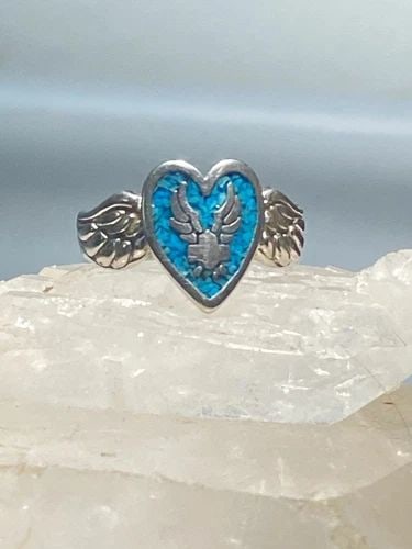 BIKER RING HEART W WINGS BAND TURQUOISE CHIPS SOUTHWEST STERLING SILVER WOMEN: BIKER RING HEART W WINGS BAND TURQUOISE CHIPS SOUTHWEST STERLING SILVER WOMEN Biker ring heart w wings band turquoise chips southwest women Size 6.25 Between a size 6.25 and a size 6.50 Weight 4.2g Le