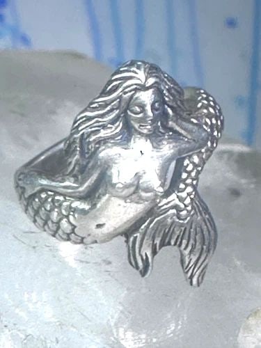 MERMAID RING FIGURATIVE STERLING SILVER SIZE 5.75 WOMEN GIRLS: MERMAID RING FIGURATIVE STERLING SILVER SIZE 5.75 WOMEN GIRLS Mermaid ring figurative sterling silver size 5.75 women girls Size 5.75 Between a size 5.75 and a szie 6 Weight 5.3g Width 1 3/16" Band in