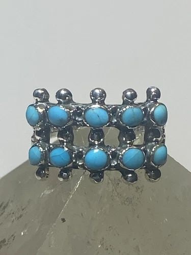 TURQUOISE RING MAN STONES BAND STERLING SILVER WOMEN GIRLS: TURQUOISE RING MAN STONES BAND STERLING SILVER WOMEN GIRLS Turquoise ring many stones sterling silver women girls Size 8 Weight 3.6g Widest part. 1/2" Thinnest part 1/8"