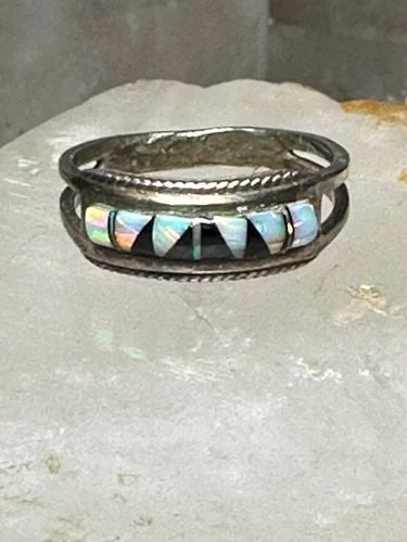 LAB OPAL RING ONYX BAND SOUTHWEST SIZE 7.25 STERLING SILVER WOMEN GIRLS: LAB OPAL RING ONYX BAND SOUTHWEST SIZE 7.25 STERLING SILVER WOMEN GIRLS Lab Opal ring onyx band southwest size 7.25 sterling silver women girls Size 7.25 Weight 2.6g Widest part 1/4" Thinnest part. 1/