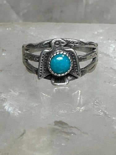 PHOENIX RING TURQUOISE SIZE 2.25 STERLING SILVER WOMEN GIRLS BABY BAND: PHOENIX RING TURQUOISE SIZE 2.25 STERLING SILVER WOMEN GIRLS BABY BAND Phoenix ring turquoise size 2.25 sterling silver women girls baby band Signed See Photos Size 2.25 Weight. 2.2g Width 5/16" Thinn