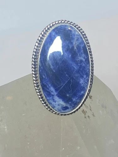 SODALITE RING LARGE STONE STERLING SILVER WOMEN GIRLS: SODALITE RING LARGE STONE STERLING SILVER WOMEN GIRLS Sodalite ring large stone sterling silver women girls Size 7.50 Weight 10.5g length. 1 1/2" width. 1" Thinnest part 1/8"