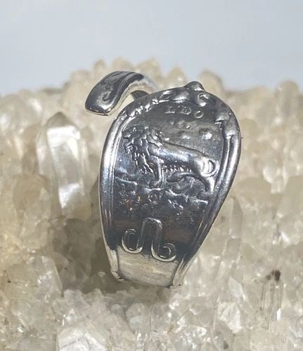 LEO SPOON RING SIZE 7.50 AUGUST LION BIRTHDAY BAND STERLING SILVER WOMEN ADJ: LEO SPOON RING SIZE 7.50 AUGUST LION BIRTHDAY BAND STERLING SILVER WOMEN ADJ Leo spoon ring August Lion birthday band sterling silver women Size 7.50 adjustable Weight. 4.3g Width 1/2" Thinnest part o