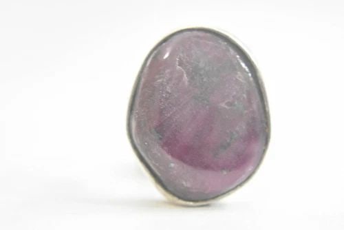 RUBY RING OVAL OBLONG BULKY STERLING SILVER BOHO WOMEN SIZE 7.25: RUBY RING OVAL OBLONG BULKY STERLING SILVER BOHO WOMEN SIZE 7.25 Ruby ring oblong bulky sterling silver boho women Ruby is a purplish red Size 7.25 Weight 11.7g length of the stone 7/8" Width of the b