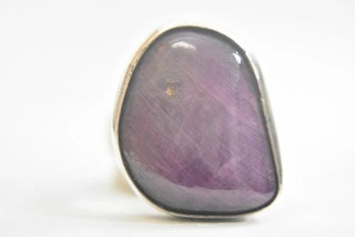 RUBY RING OBLONG BULKY STERLING SILVER BOHO WOMEN SIZE 6.75: RUBY RING OBLONG BULKY STERLING SILVER BOHO WOMEN SIZE 6.75 Ruby ring oblong bulky sterling silver boho women Ruby is a purplish red Size 6.75 Weight 18.7 length of the stone 1 1/16" Width of the band