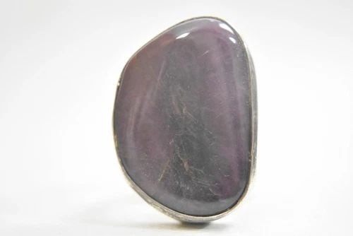 RUBY RING OBLONG BULKY STERLING SILVER BOHO WOMEN SIZE 5.75: RUBY RING OBLONG BULKY STERLING SILVER BOHO WOMEN SIZE 5.75 Ruby ring oblong bulky sterling silver boho women Ruby is a purplish red Size 5.75 Weight 20.5 length of the stone 1 1/4" Width of the band 