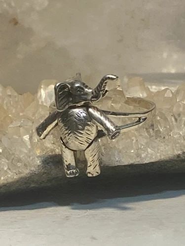 ELEPHANT RING SIZE 8.75 MOVING BAND STERLING SILVER WOMEN GIRLS: ELEPHANT RING SIZE 8.75 MOVING BAND STERLING SILVER WOMEN GIRLS Elephant ring moving band sterling silver women girls Size 8.75 Weight 4.8g Length. 7/8" Width 1/2" Thinnest part of band 3/32"