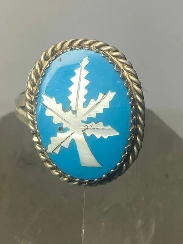 MARIJUANA RING TURQUOISE MOP POT SOUTHWEST STERLING SILVER WOMEN: MARIJUANA RING TURQUOISE MOP POT SOUTHWEST STERLING SILVER WOMEN Marijuana ring turquoise MOP southwest pot sterling silver women Size 7.50 Weight 3.8g Length 7/8" Widest part 5/8" Thinnest part 1/8"