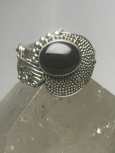 ONYX RING SOUTHWEST BAND STERLING SILVER WOMEN: ONYX RING SOUTHWEST BAND STERLING SILVER WOMEN Onyx ring southwest band sterling silver women Size 9.75 Weight 14.3g Widest part 3/4" Thinnest back of band 1/4"