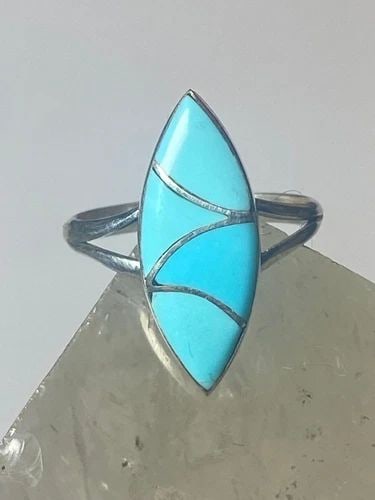 LONG TURQUOISE RING SOUTHWEST PINKY STERLING SILVER WOMEN GIRL: LONG TURQUOISE RING SOUTHWEST PINKY STERLING SILVER WOMEN GIRL Long Turquoise Ring southwest pinky sterling silver women girl Size 4.25 Weight 1.7g Length 3/4" Width 9/32" Thinnest part 3/32"