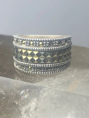 JUDITH JACK RING MARCASITE CIGAR BAND STERLING SILVER WOMEN GIRLS: JUDITH JACK RING MARCASITE CIGAR BAND STERLING SILVER WOMEN GIRLS Judith Jack ring marcasite cigar band sterling silver women girls Size 4.75 Weight 5.2g Widest part 7/16" Thinnest part of band 1/4"
