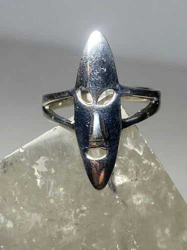 LONG FACE RING MASK TRIBAL BAND STERLING SILVER WOMEN GIRLS: LONG FACE RING MASK TRIBAL BAND STERLING SILVER WOMEN GIRLS long face ring mask tribal band sterling silver women girls Size 8.75 Between a size 8.75 and a size 9 Weight 3.3g Length 1" Width 3/8" Thin