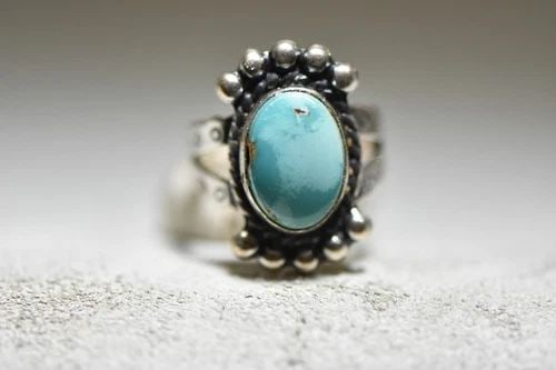 TURQUOISE RING NAVAJO WOMEN GIRLS STAMPED BAND STERLING SILVER: TURQUOISE RING NAVAJO WOMEN GIRLS STAMPED BAND STERLING SILVER Turquoise ring Navajo women girls stamped band sterling silver Size 6 Weight. 5.6g Length 1" Width 5/8" Thinnest part of band. 1/8" Free 