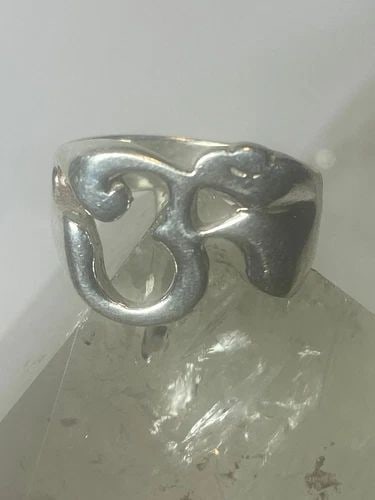 OHM RING SOUND OFF THE UNIVERSE BAND STERLING SILVER WOMEN MEN: OHM RING SOUND OFF THE UNIVERSE BAND STERLING SILVER WOMEN MEN Ohm ring sound off the universe band sterling silver women men Size 6.25 Weight 7.3g Widest part 1/2" Thinnest part of band 3/16" Band Wi