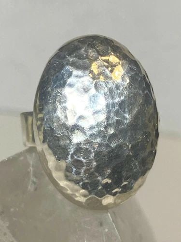 HAMMERED RING LARGE OVAL SOUTHWEST STERLING SILVER BAND WOMEN GIRLS: HAMMERED RING LARGE OVAL SOUTHWEST STERLING SILVER BAND WOMEN GIRLS Hammered ring Large Oval southwest sterling silver band women girls Size 6.75 Weight 14.9g Length. 1 1/8" Width 7/8" Thinnest part 7
