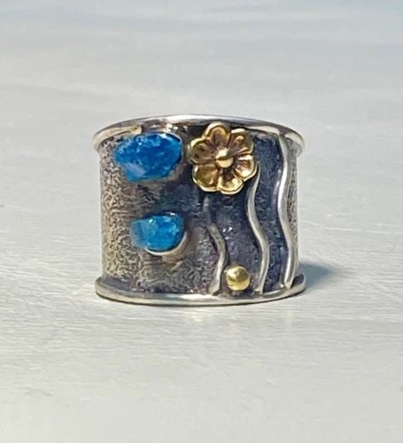 FLORAL RING CIGAR BAND BOHO BLUE CRYSTAL QUARTZ STERLING SILVER WOMEN GIRLS: FLORAL RING CIGAR BAND BOHO BLUE CRYSTAL QUARTZ STERLING SILVER WOMEN GIRLS Floral Ring cigar band boho blue crystal quartz sterling silver women girls Detailed with an overlay on the flower Size 6.75