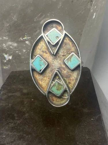 LONG RING TURQUOISE SIZE 6.50 SOUTHWEST STERLING SILVER WOMEN GIRLS V: LONG RING TURQUOISE SIZE 6.50 SOUTHWEST STERLING SILVER WOMEN GIRLS V Long ring turquoise southwest sterling silver women girls v Size 6.50 Weight 4.5g Length 1. 1/4" Width 5/8" Thinnest part of band 