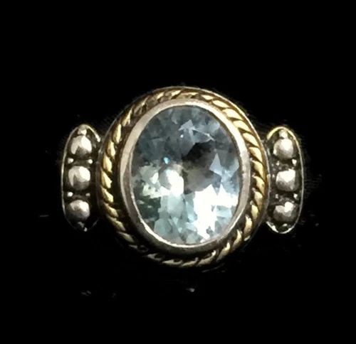 VINTAGE STERLING SILVER RING W LIGHT POWDER BLUE FACETED STONE W GOLD SIZE 6: VINTAGE STERLING SILVER RING W LIGHT POWDER BLUE FACETED STONE W GOLD SIZE 6 Vintage Sterling Silver Ring w Light Powder Blue Faceted Stone Detailing with Gold Overlay Size 6 Between a Size 5.75 and a