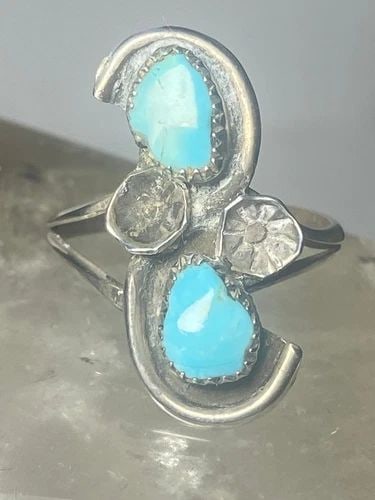 TURQUOISE RING SIZE 5.25 BLOSSOM LONG BAND SOUTHWEST STERLING SILVER WOMEN GIRLS: TURQUOISE RING SIZE 5.25 BLOSSOM LONG BAND SOUTHWEST STERLING SILVER WOMEN GIRLS Turquoise ring blossom long band southwest sterling silver women girls Size 5.25 Weight 2g Length 7/8" Width 1/2" Thinn