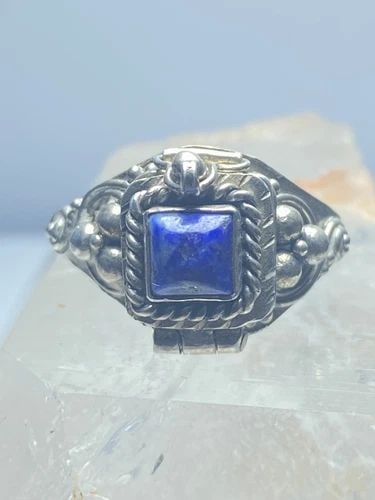 POISON RING BLUE LAPIS STERLING SILVER WOMEN GIRLS: POISON RING BLUE LAPIS STERLING SILVER WOMEN GIRLS Poison ring blue lapis sterling silver women girls Size 6 Weight 4.4g Length 3/8" Locket width and length is 3/16" Thinnest part of band. 1/8"