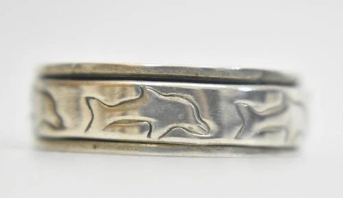 DOLPHIN SPINNER RING THUMB BAND STERLING SILVER MEN RING SIZE 13: DOLPHIN SPINNER RING THUMB BAND STERLING SILVER MEN RING SIZE 13 Dolphin spinner ring thumb band sterling silver men ring size 13 Between a Size 13 and Size 13.25 weight 9.1g Band width 9/32" Delivere