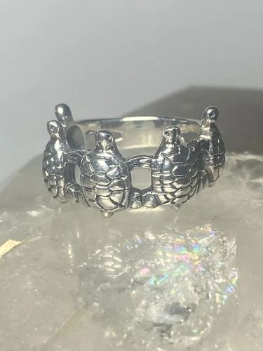 TURTLE RING TURTLES BAND STERLING SILVER WOMEN GIRLS: TURTLE RING TURTLES BAND STERLING SILVER WOMEN GIRLS Turtle ring turtles band sterling silver women girls Size 5 Weight 3.8g Width 13/32" Thinnest part of band is 5/32"