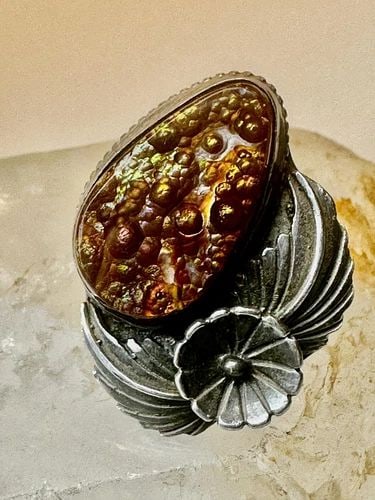 FIRE AGATE RING SIZE 10 NAVAJO SQUASH BLOSSOM STERLING SILVER WOMEN: FIRE AGATE RING SIZE 10 NAVAJO SQUASH BLOSSOM STERLING SILVER WOMEN Fire Agate ring size 10 Navajo squash blossom sterling silver women Size 10 Weight 12g Length 1 1/4" Width 7/8" Thinnest part of ban