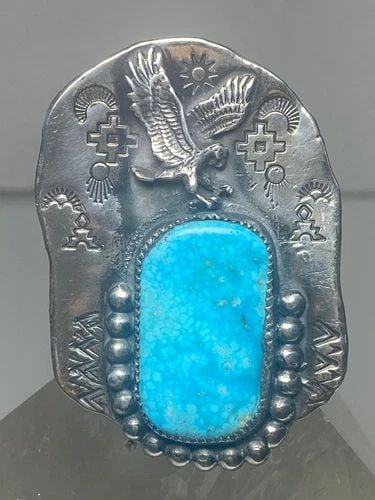 EAGLE RING TURQUOISE BIRD NAVAJO SOUTHWEST STERLING SILVER: EAGLE RING TURQUOISE BIRD NAVAJO SOUTHWEST STERLING SILVER Eagle ring turquoise bird Navajo southwest sterling silver Size 9.75 Weight 27.5g Length. 2 1/8" Width 1. 1/2" Thinnest part 3/16"