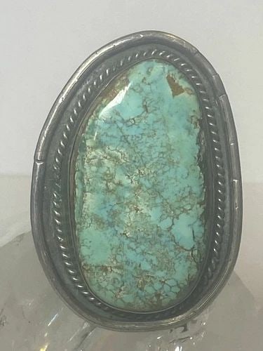 NAVAJO RING LONG HUGE TURQUOISE SOUTHWEST STERLING SILVER WOMEN GIRL: NAVAJO RING LONG HUGE TURQUOISE SOUTHWEST STERLING SILVER WOMEN GIRL Navajo Ring long turquoise southwest sterling silver women girl Size 6.25 Weight 27.8g Length. 2 1/4" Width. 1. 1/2" Thinnest part 