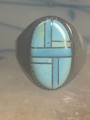 ZUNI RING TURQUOISE BAND SIZE 10.25 STERLING SILVER: ZUNI RING TURQUOISE BAND SIZE 10.25 STERLING SILVER Zuni ring Turquoise band size 10.25 sterling silver SIze 10.25 Weight 13.4g Length 7/8" Width 1/2" Thinnest part of band 3/16"