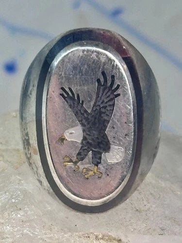 NAVAJO EAGLE RING SIZE_9.25 STERLING SILVER WOMEN MEN SIGNED BB: NAVAJO EAGLE RING SIZE_9.25 STERLING SILVER WOMEN MEN SIGNED BB Navajo Eagle ring size_9.25 sterling silver women men signed BB Size 9.25 Weight 5.1g Length 3/8" Thinnest part of band in back 3/16"