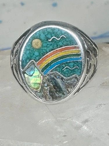 PHOENIX RAINBOW RING 10.5 TURQUOISE CORAL SEAGULL MOUNTAIN STERLING SILVER MEN: Phoenix Rainbow ring 10.5 turquoise coral seagull mountain sterling silver men women southwest Between a size 10.5 and a size 10.75 Weight 9.1g Length. 3/4" Width. 5/8" Thinnest part of band 3/16"